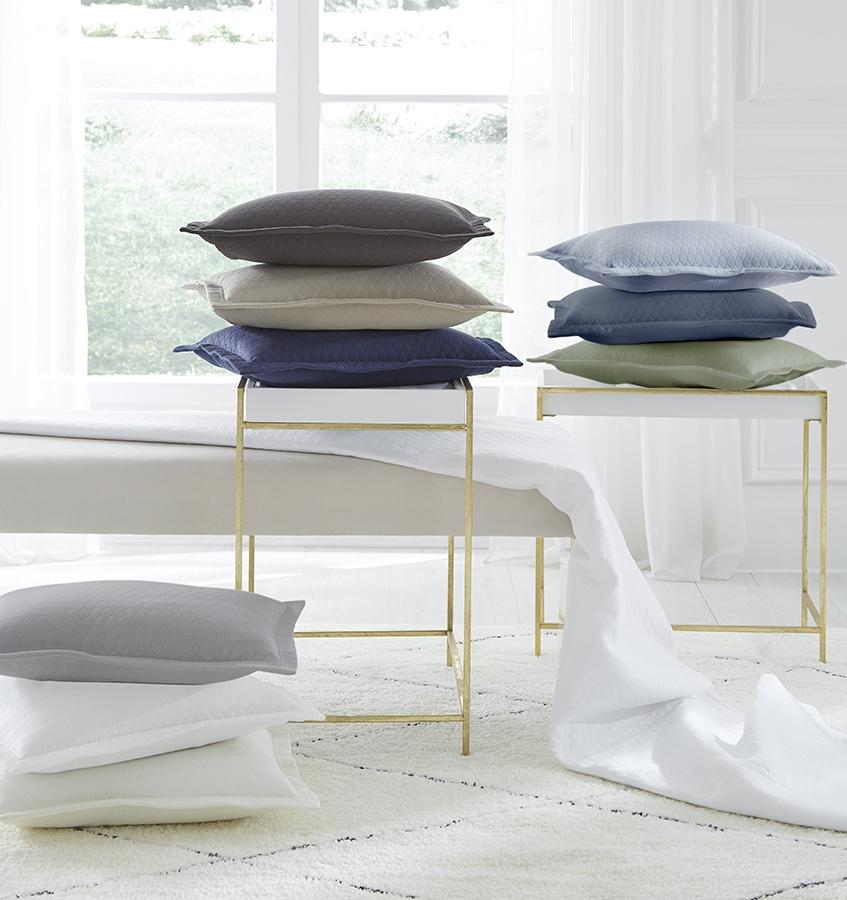 A luxury SFERRA cotton bed skirt in a woven honeycomb pattern. The Favo Collection is available in an array of colors.