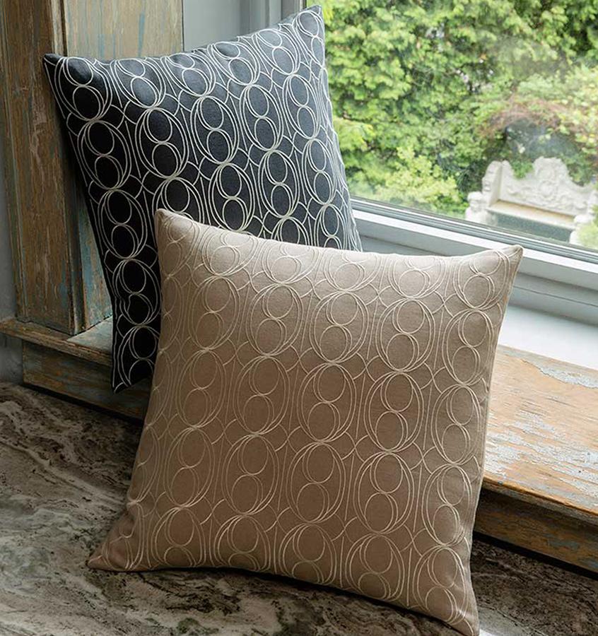 SFERRA's Linna European-woven linen pillow is laced in pretty repeat amidst graphic lines and crescent-shaped curves.