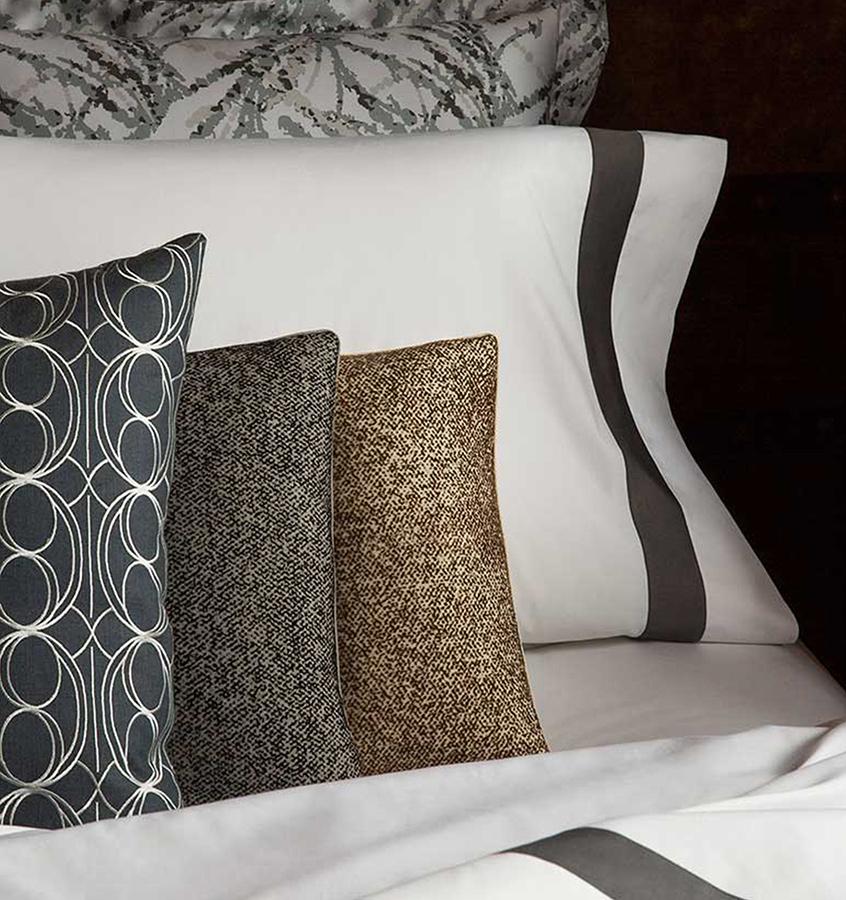 SFERRA Nissa Decorative Pillow features soft colors of velvety flocking pressed atop a lush woolen ground, similar to a suiting fabric.