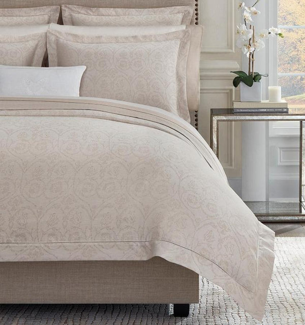 Soft rose and white yarns create an elegant jacquard weave on SFERRA's Amiata Duvet Cover.