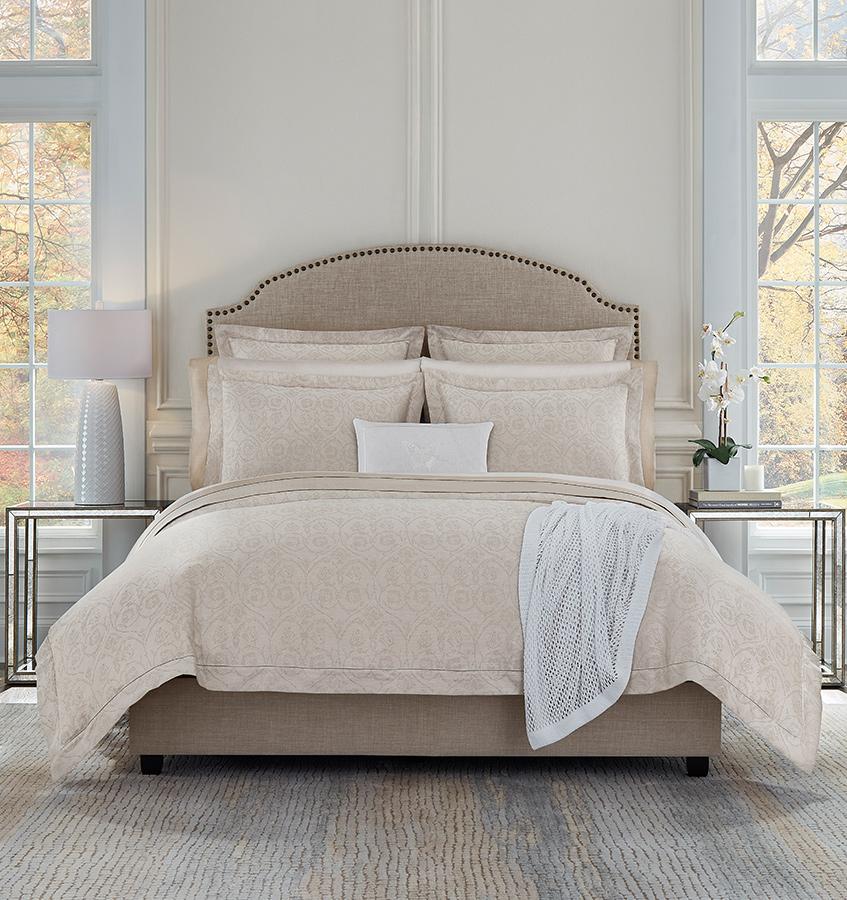 Soft rose and white yarns create an elegant jacquard weave on SFERRA's Amiata Duvet Cover.