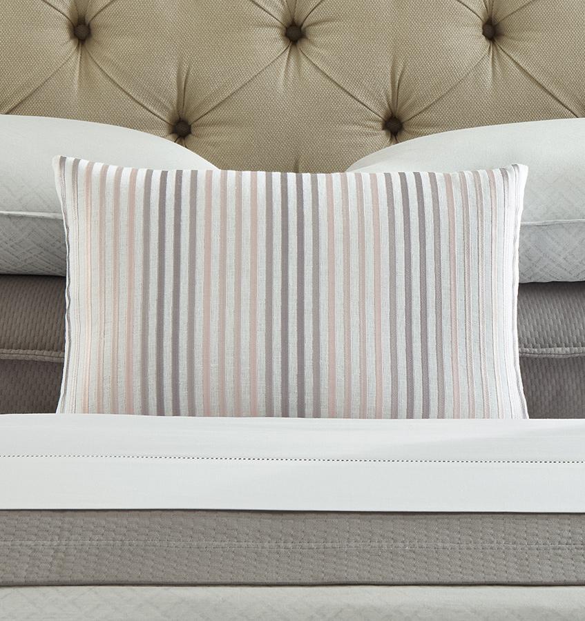 Lineare  decorative  pillow  is  accented  with  embroidered  ombré  stripes  on  a  crisp  linen  base  fabric. 