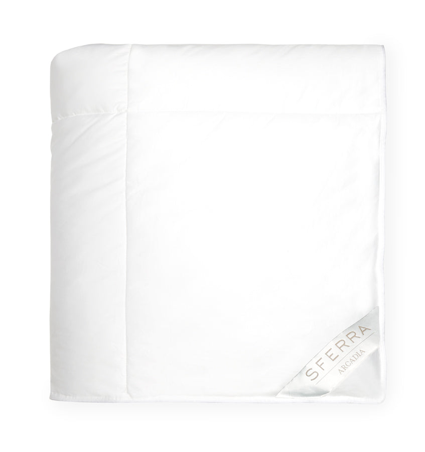 A hypoallergenic microfiber fills SFERRA's Arcadia down alternative duvet.