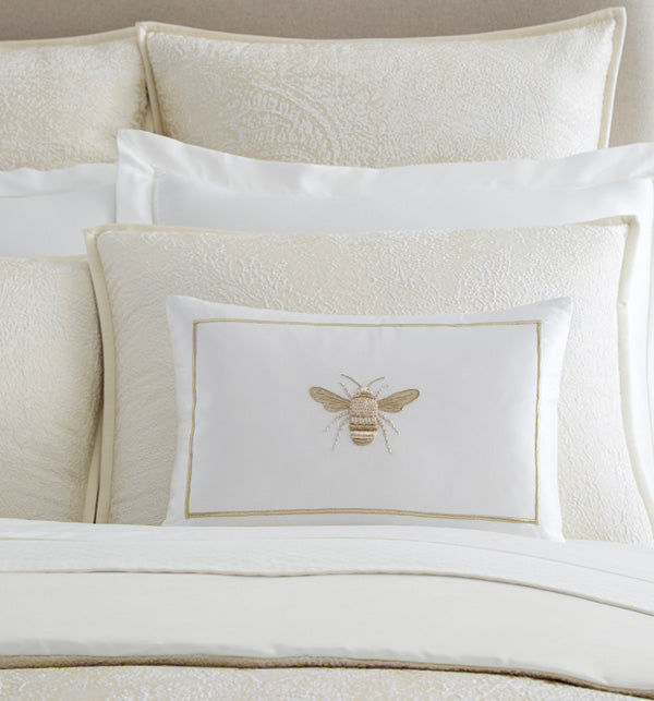 SFERRA Miele Decorative Pillow is embellished with an intricate golden bee motif in Zardozi embroidery on a luminous silk satin-base.