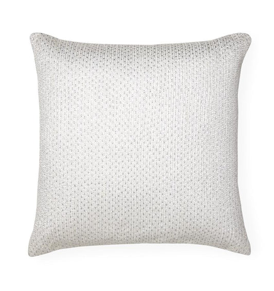 The SFERRA Nemi Decorative Pillow is embroidered with delicate boucle threads in an all-over textural pattern on a white linen base, with silver embroidery details.