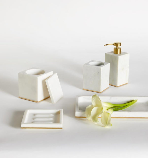 Gold-trimmed white marble SFERRA bath accessories against a white background.