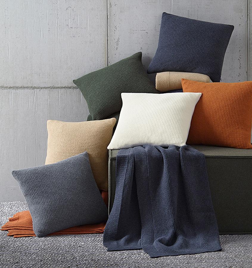 In a chunky lambswool knit, our Pettra decorative pillow is more than a welcoming spot to rest-it's an invitation to daydream in the comfort of its warmth.