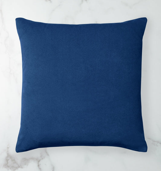 Velluto is a versatile, two-toned velvet decorative pillow in a rich color palette of blues, greys and beige.